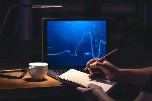 Man Trading Browsing Online Stock Investments Night Scaled