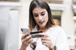 Shopping Girl Using Shopping Card Scaled